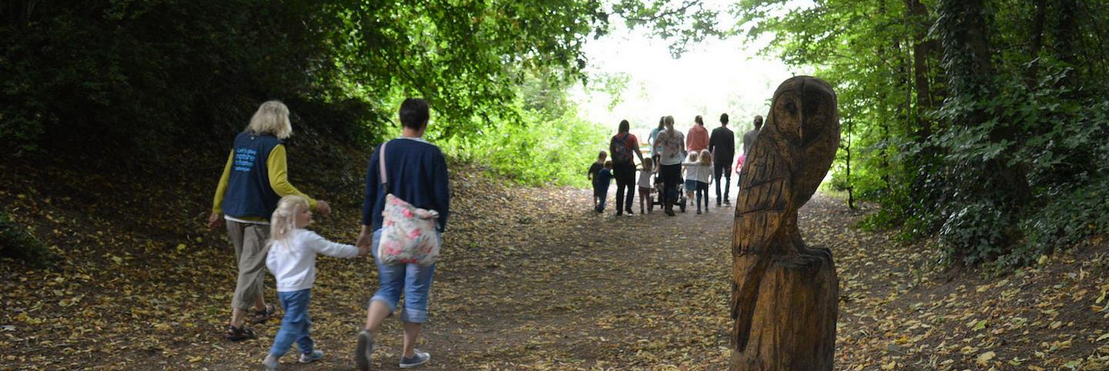 Families enjoying a walk along the Owl Trail at Kingfisher Barn